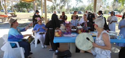 nuns-in-park-drumming